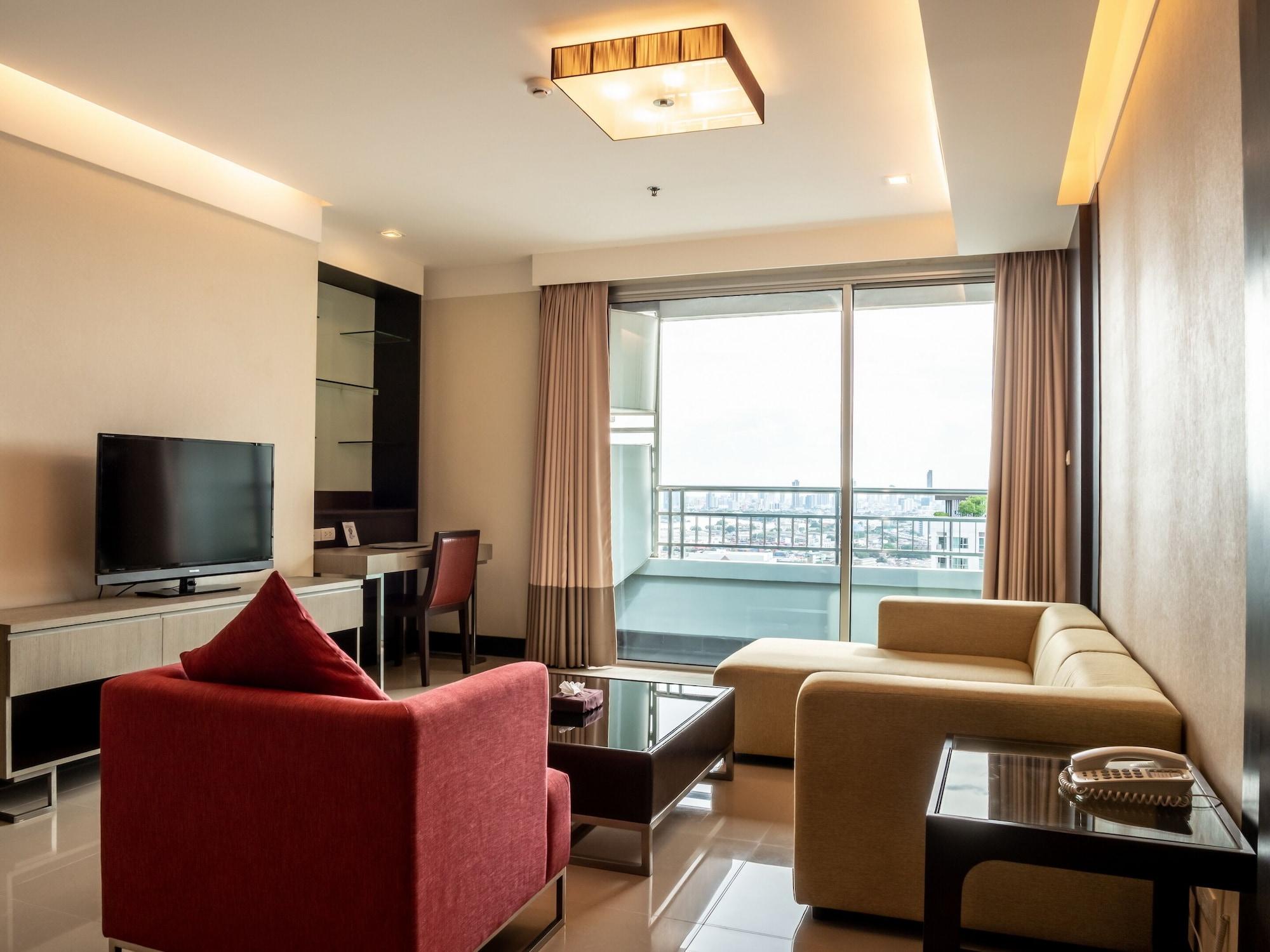 Jasmine Grande Residence Бангкок Экстерьер фото A living room in a condominium
